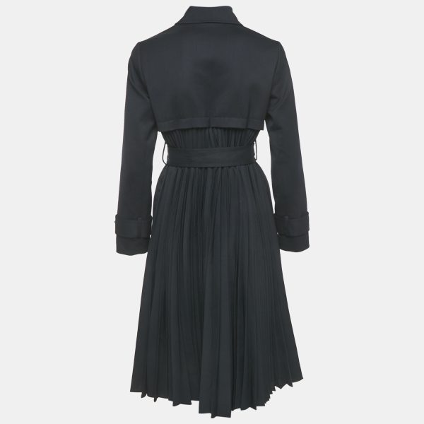 this Sandro trench coat features pleated inserts for unexpected movement and flair. Crafted in a warm wool blend