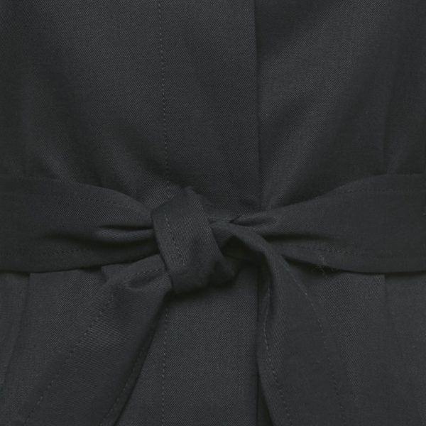 it’s perfect for layered styling. A sophisticated outerwear update for cooler days.