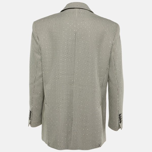 while its boxy tailoring captures effortless Parisian chic. Perfect over denim or dresses