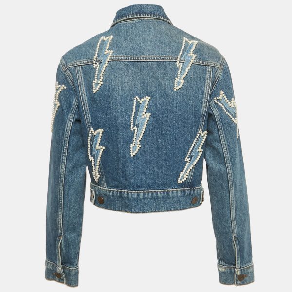 adorned with lightning strike beadwork all over. Structured yet wearable