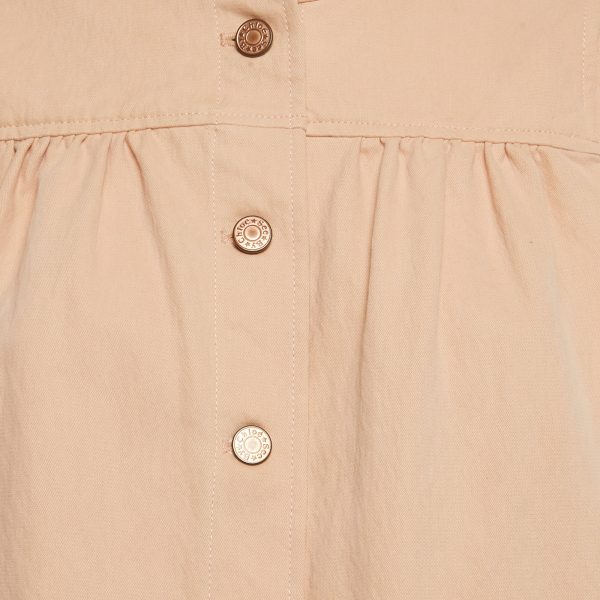 making it a versatile layer across seasons.