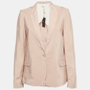 Zadig and Voltaire infuses tailoring with sweet color in this Victor Jacq blazer. Its sharp cut and tonal star patterns strike a balance between edge and whimsy.
