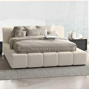 The exquisite Halsted upholstered platform bed is generously scaled with a sleek aesthetic. The plush upholstery envelops the entire frame