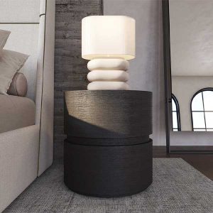 Introducing the Collier Nightstand - an exquisite blend of functionality and aesthetics.Crafted from rich walnut